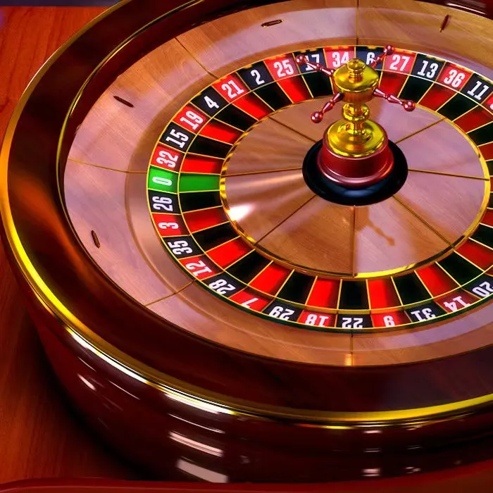 An expert croupier at a high-stakes roulette station with gold trim — the signature aesthetic of 8999Bet.