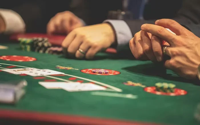 Player with neon gaming art and high-speed video streams — the high-energy atmosphere of 8999Bet in the Bangladesh market.