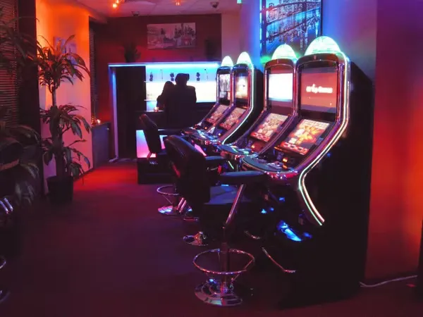 Cheerful BD bettor pointing to a bright entrance with game icons — showing easy account assistance and fixes.